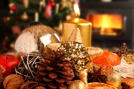 chistmas decoration in front of tree and fireplace.の写真素材
