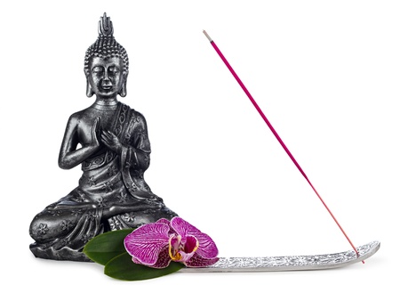 buddha sculpture with incense stick and orchid blossomの写真素材