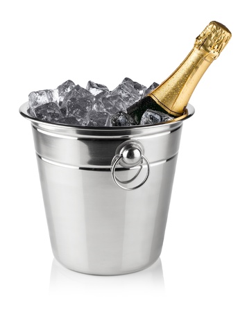 bottle of champagne in cooler with ice cubesの写真素材