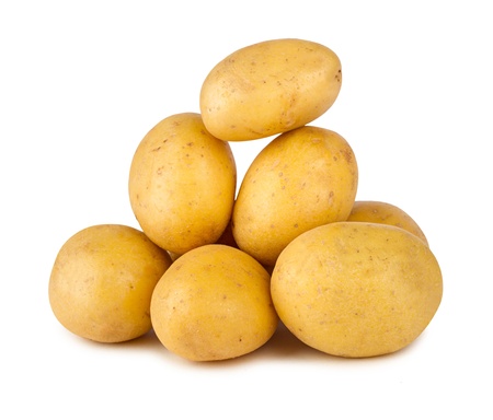 a stack of fresh potatoesの写真素材