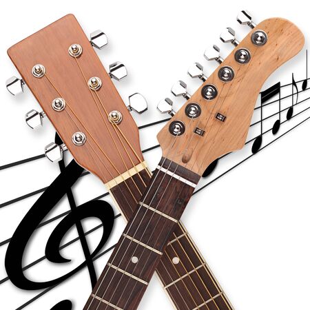 2 guitar heads on music sheetの写真素材