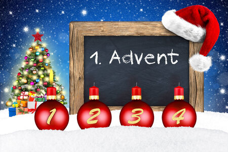 xmas advent backgound with chalkboard in snowの写真素材