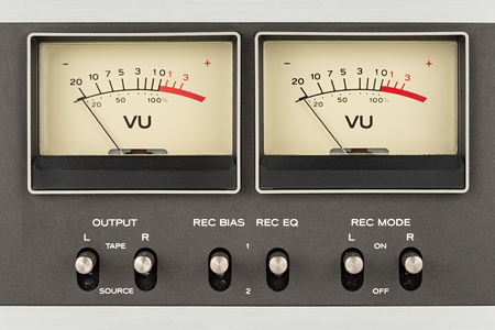 close up of two retro vu meter and switchesの写真素材
