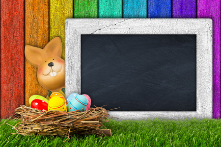 easter bunny with white blackboardの写真素材