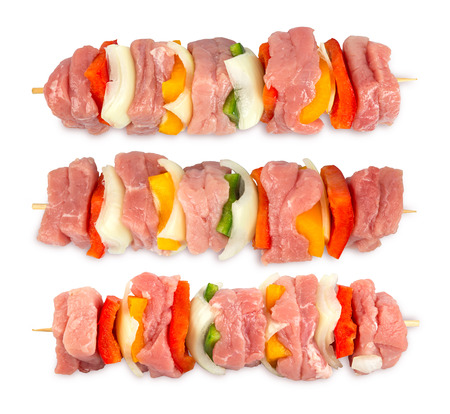 raw shashlik sticks on white backgroundの写真素材