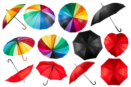 collection of black red and rainbow umbrellas isolated on white backgroundの写真素材
