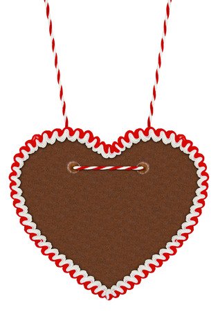 empty gingerbread heart isolated on white backgroundの写真素材