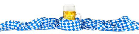 german oktoberfest beer mug in bavarian flagの写真素材
