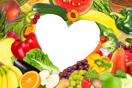 heart shaped frame out of fruits and vegetables isolated on white backgroundの写真素材
