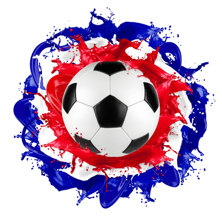 retro soccer ball with romanian flag color splash isolated on white backgroundの写真素材