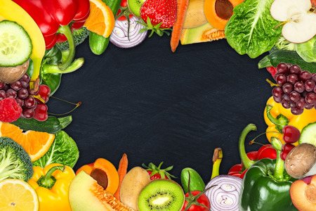 frame out of fruits and vegetables on slate backgroundの写真素材