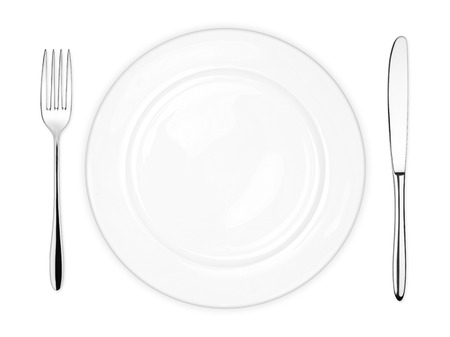 place setting with empty dish fork and knife isolated on white backgroundの写真素材