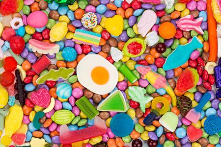 background of colorful tasty candiesの写真素材