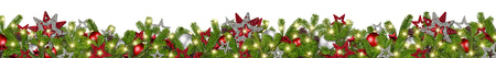 christmas garland super wide panorama banner with fir branches red silver stars lights and baubles xmas decoration isolated on white backgroundの写真素材