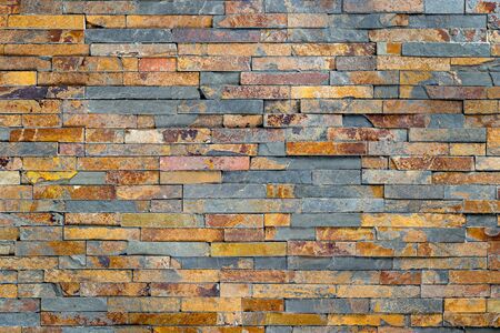 texture of gray multicolored slate stone rock backgroundの写真素材