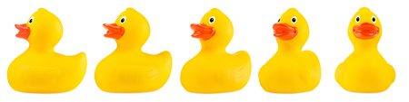 yellow classic rubber bath duck toy panorama set collection row isolated on white backgroundの写真素材