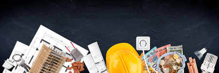 dream of owning a house planing home property finance construction concept wide panorama  background on empty slate blackboardの写真素材