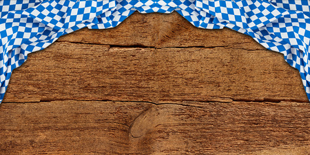 old rustic retro wood wooden texture with bavarian flag dark brown vintage weathered natural Oktoberfest panorama backgroundの写真素材