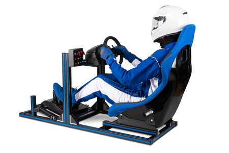 race driver in blue overall with helmet taining on simracing aluminum simulator rig for video game...