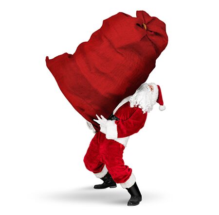 classic traditional crazy funny santa claus on exhausting delivery service. carrying huge giant big red bag with christmas gift present  isolated on white backgroundの写真素材