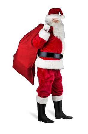classic traditional red santa claus with red jute bag sack full of gift present ready for delivery isolated on white christmas backgroundの写真素材