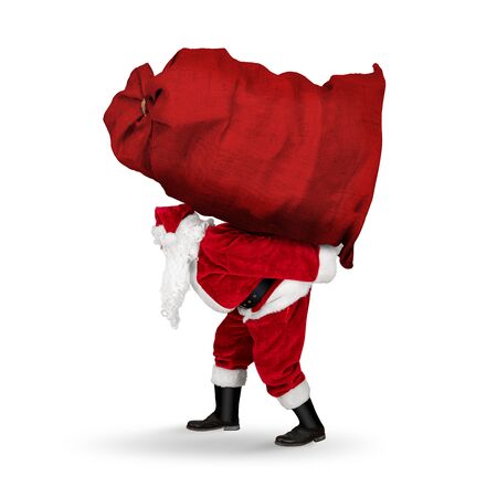 classic traditional crazy funny santa claus on exhausting delivery service. Carrying huge giant big red bag on his back with christmas gift present  isolated on white christmas backgroundの写真素材