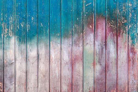 wooden weathered rustic colorful blue turquoise red wooden wood panel plan abstract texture pattern backgroundの写真素材