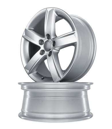 modern shiny silver metallic alloy aluminum car rims stack isolated on white background. automotive part indurstry transportation conceptの写真素材