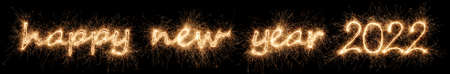happy new year 2022 greeting. golden bright modern sparkler number and letter isolated on black. new year's eve celebration backgroundの写真素材