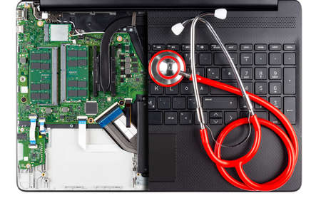 sectional top view of black modern laptop notebook computer with red doctor stethoscope isolated on white background. Pc repair help upgrape concept.の写真素材