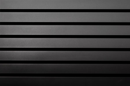 A dark metallic pattern suitable as a base or background.の写真素材