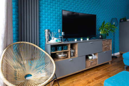 A flat with blue walls decorated in a modern style suitable for a background.の写真素材