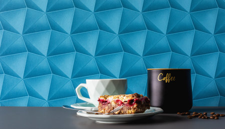 A background with blue wallpaper - colorful space. Delicious slice of cake with forkの写真素材