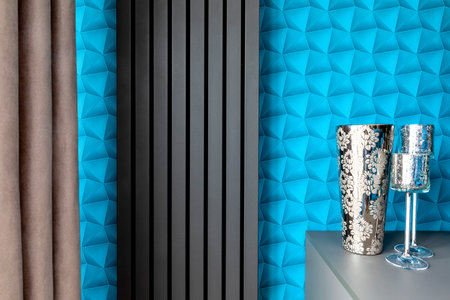 A flat with blue walls decorated in a modern style suitable for a background.の写真素材