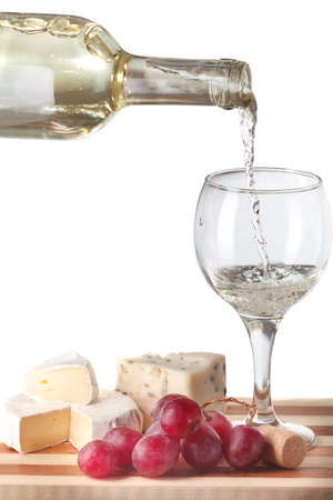 Cheese and white wine isolated on white backgroundの写真素材