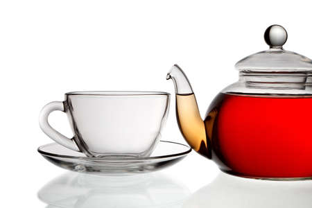 Teapot with tea and cupの写真素材