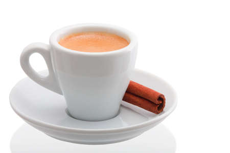 Coffee cup with cinnamon Isolated on white background の写真素材