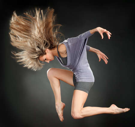 attractive jumping woman dancer 