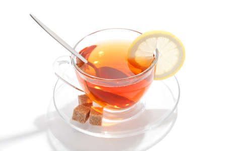 Glass cup of tea with white backgroundの写真素材