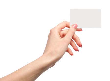 Female hand holding a blank business cardの写真素材