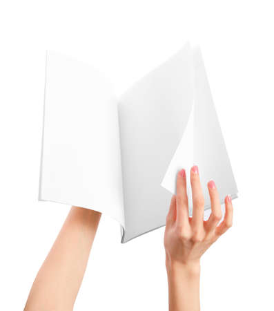 Hands holding blank newspapeの写真素材