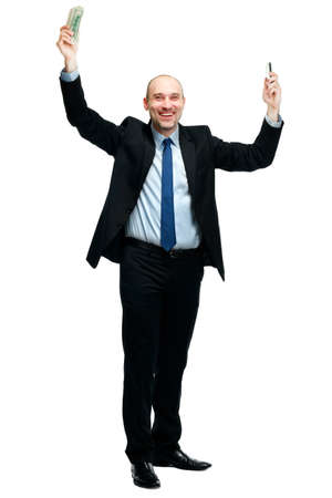 Happy man holding money and phone, isolated on white backgroundの写真素材