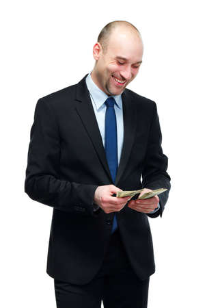 Man considers moneyの写真素材