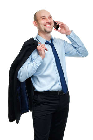 Happy businessman winning while talking on the phoneの写真素材