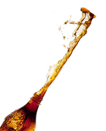 Cola splash from a bottleの写真素材