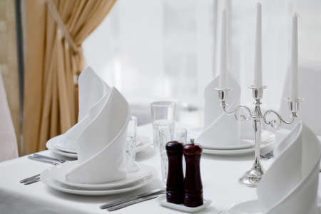 Empty glasses set in restaurantの写真素材
