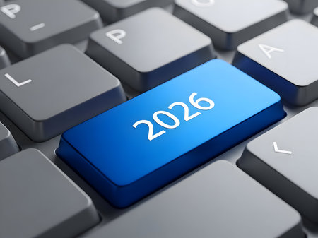 The year 2026 is displayed on a blue computer key, symbolizing the future, technological advancements, and the passage of time in the digital ageの素材