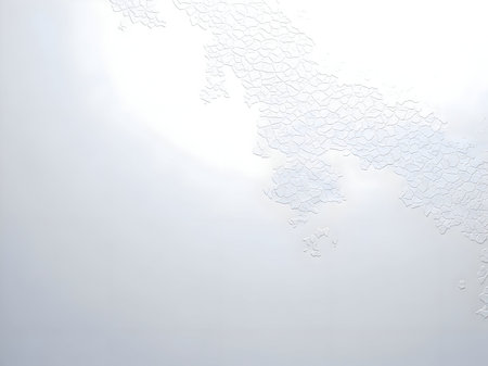 Delicate abstract organic frost-like texture on a bright white background resembling intricate ice crystals or cellular patterns for designの素材