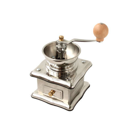 Old-fashioned coffee grinder isolated in white backgroundの写真素材