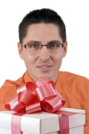 Elegant man with a gift, isolated in white backgroundの写真素材